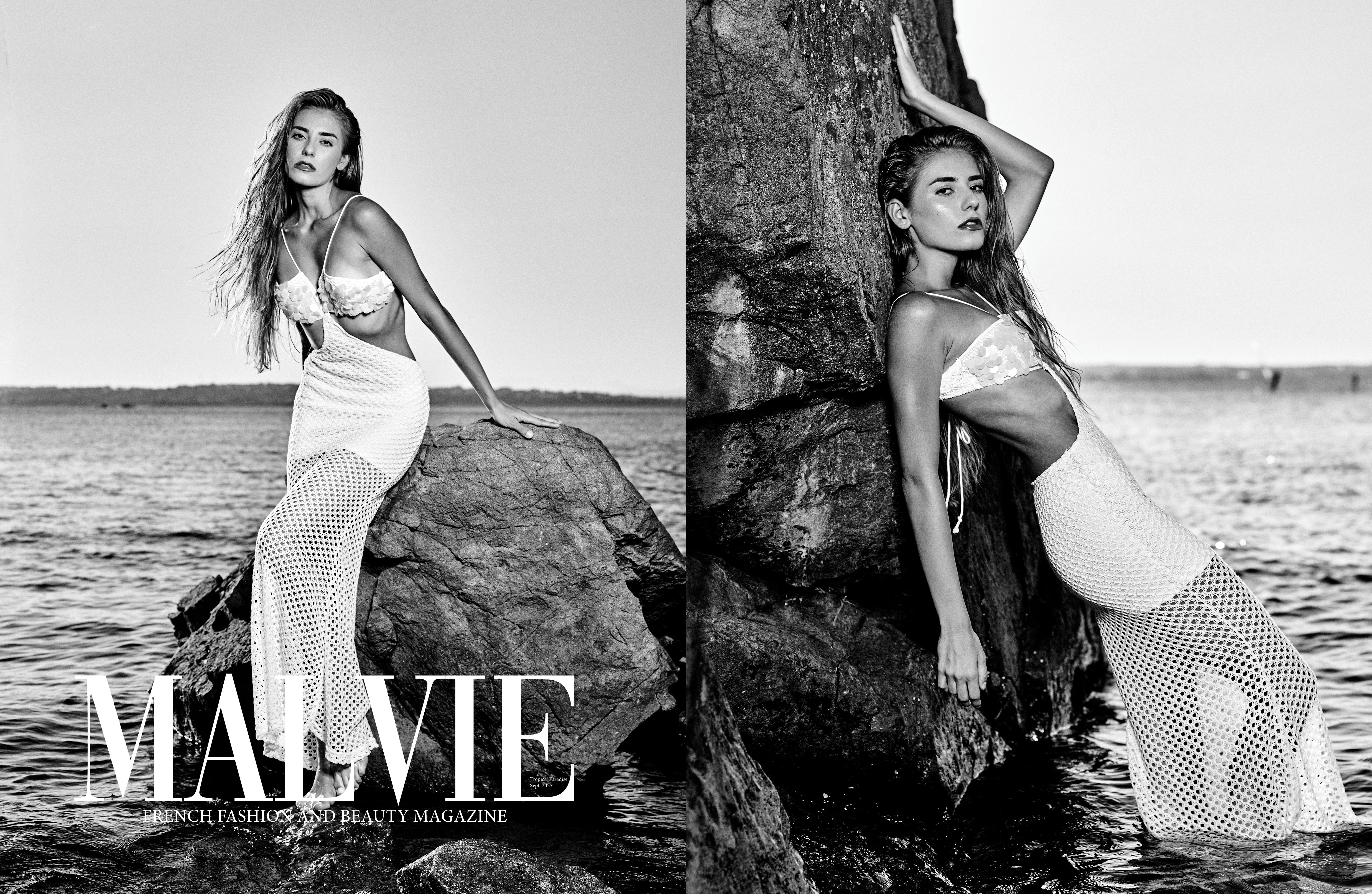 Martina Georgieva posing by rocky seashore in white knitwear